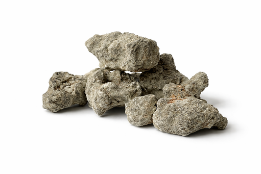 ile of gray  copal rocks on a white background